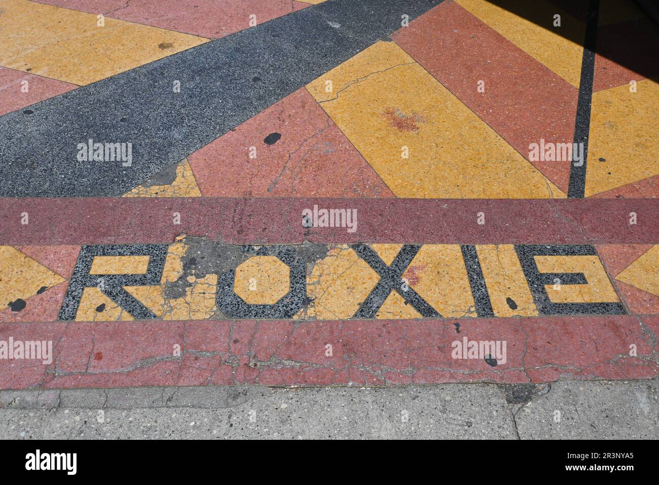 LOS ANGELES, CALIFORNIA - 17 MAY 2023: Roxie mosaic in the sidewalk outside the historic old Roxie Theatre on Broadway. Stock Photo