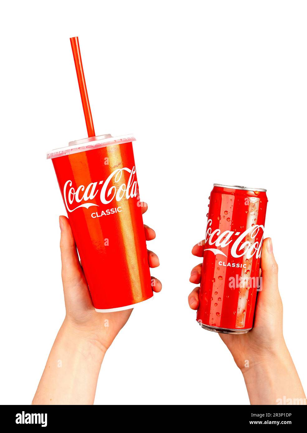 https://c8.alamy.com/comp/2R3P1DP/berlin-germany-may-23-2023-hands-holding-cola-drinks-in-red-packages-takeaway-paper-cup-mug-with-straw-and-can-tin-isolated-on-white-2R3P1DP.jpg