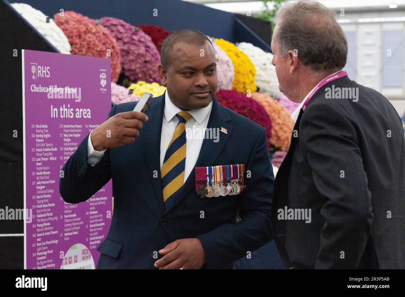 London, UK, 22 May 2023: Johnson Beharry in conversation with Piers Morgan at the Chelsea Flower Show.  Anna Watson/Alamy Live News Stock Photo