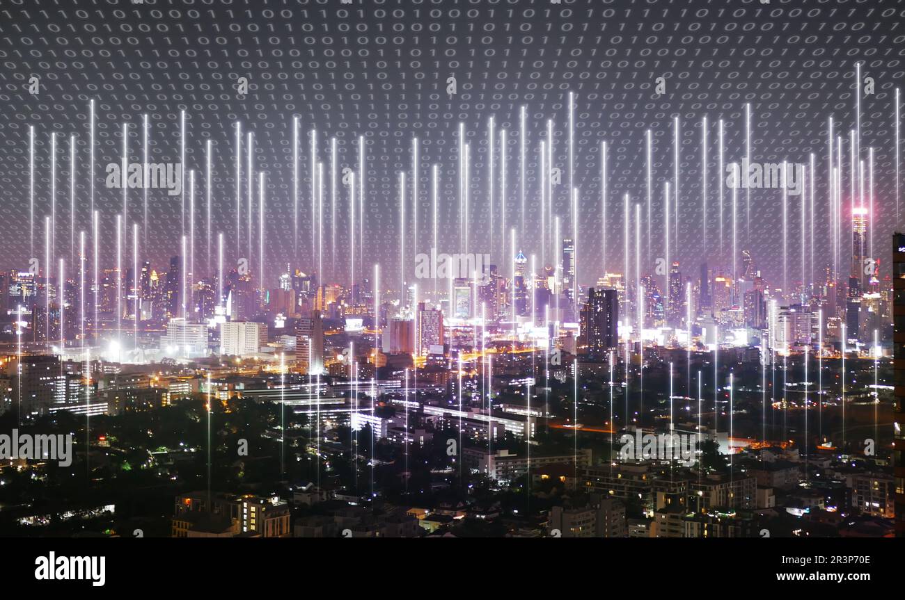 A city covered by binary code with cellular signal everywhere sending into the network. Wireless network and Connection technology concept Stock Photo