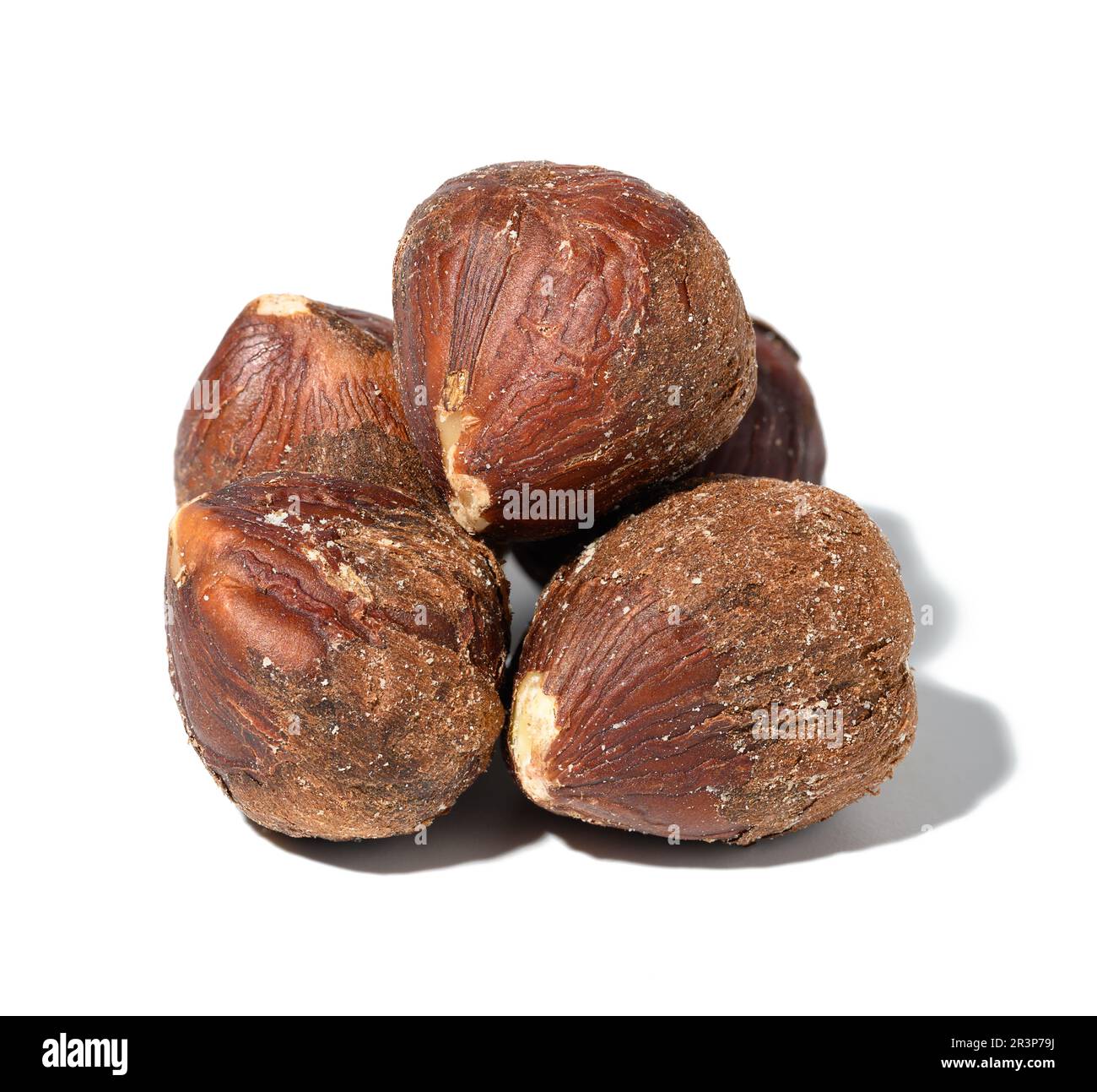Peeled hazelnuts on a white isolated background Stock Photo