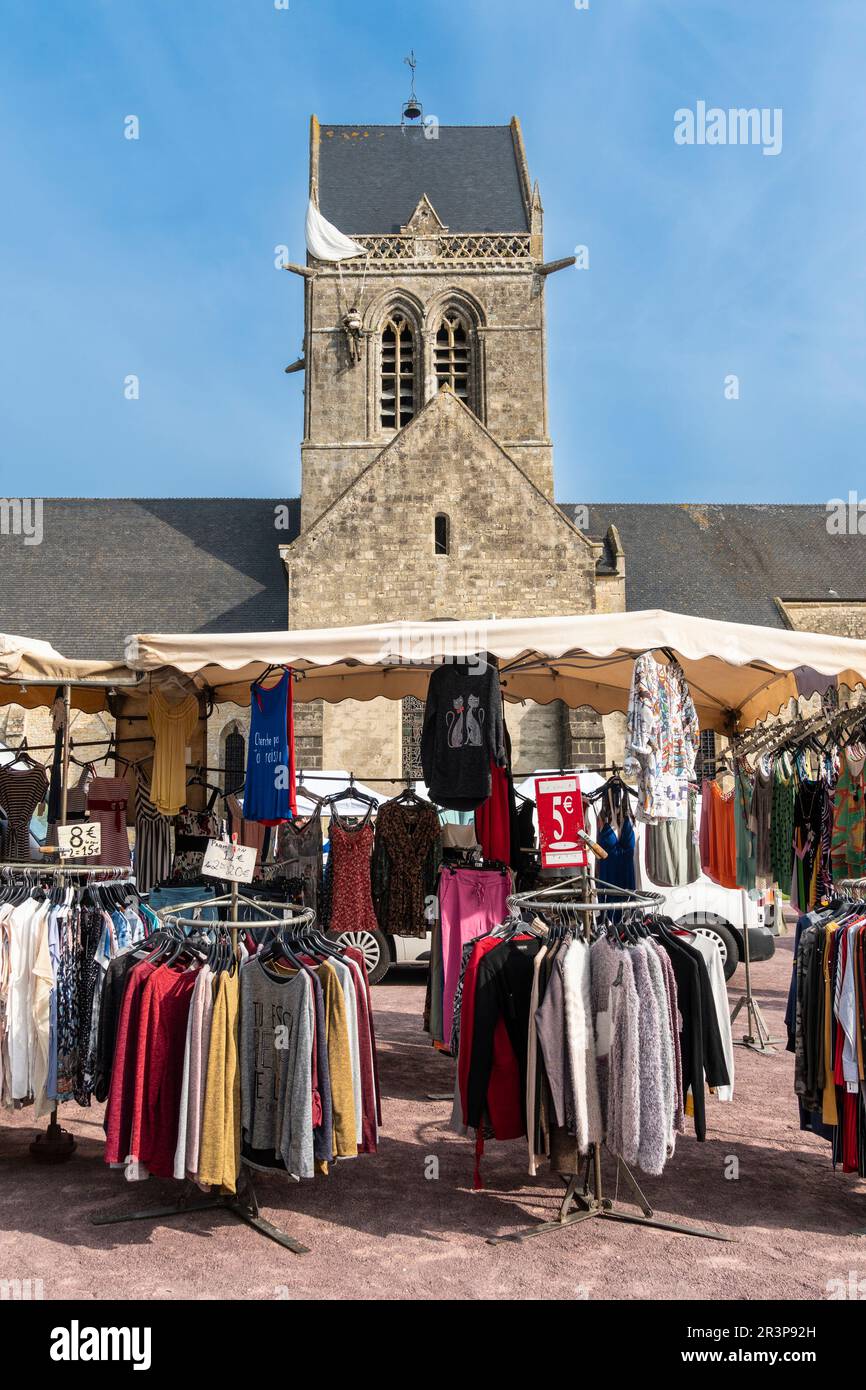 Normandy, France. Market day at Sainte-Mère-Église, the first town liberated by the Allies in ww2, and a popular site for battlefield tourists. Stock Photo