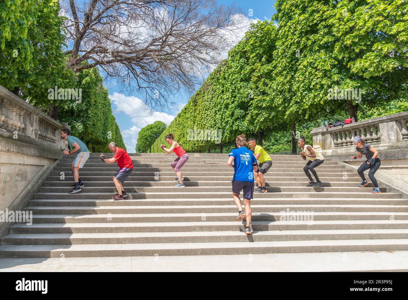 Tuileries Gardens, Paris, France. Sports class near the entrance to the gardens. Stock Photo