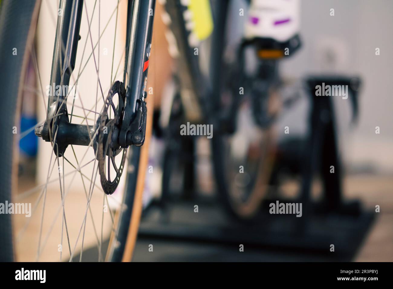 Front bicycle wheel with disk brake on an indoor scene Stock Photo Alamy