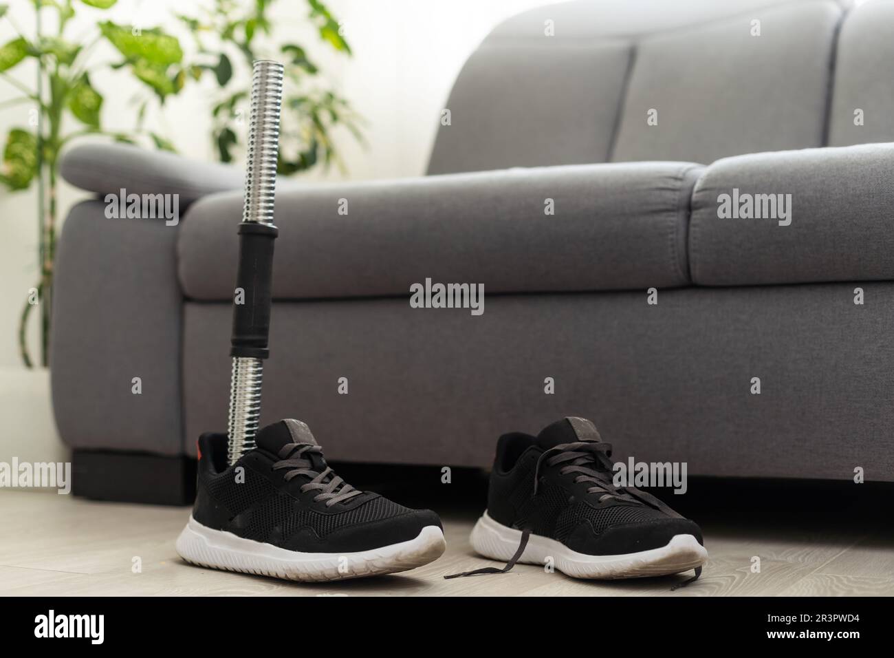 High angle background of disassembled prosthetic leg and foot on table in orthopedic equipment shop, disability concept Stock Photo