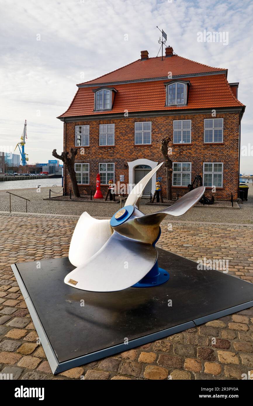 rudder propeller for harbor and ocean-going tugs in front of the Baumhaus, Hanseatic city of Wismar, Germany, Mecklenburg-Western Pomerania, Wismar Stock Photo