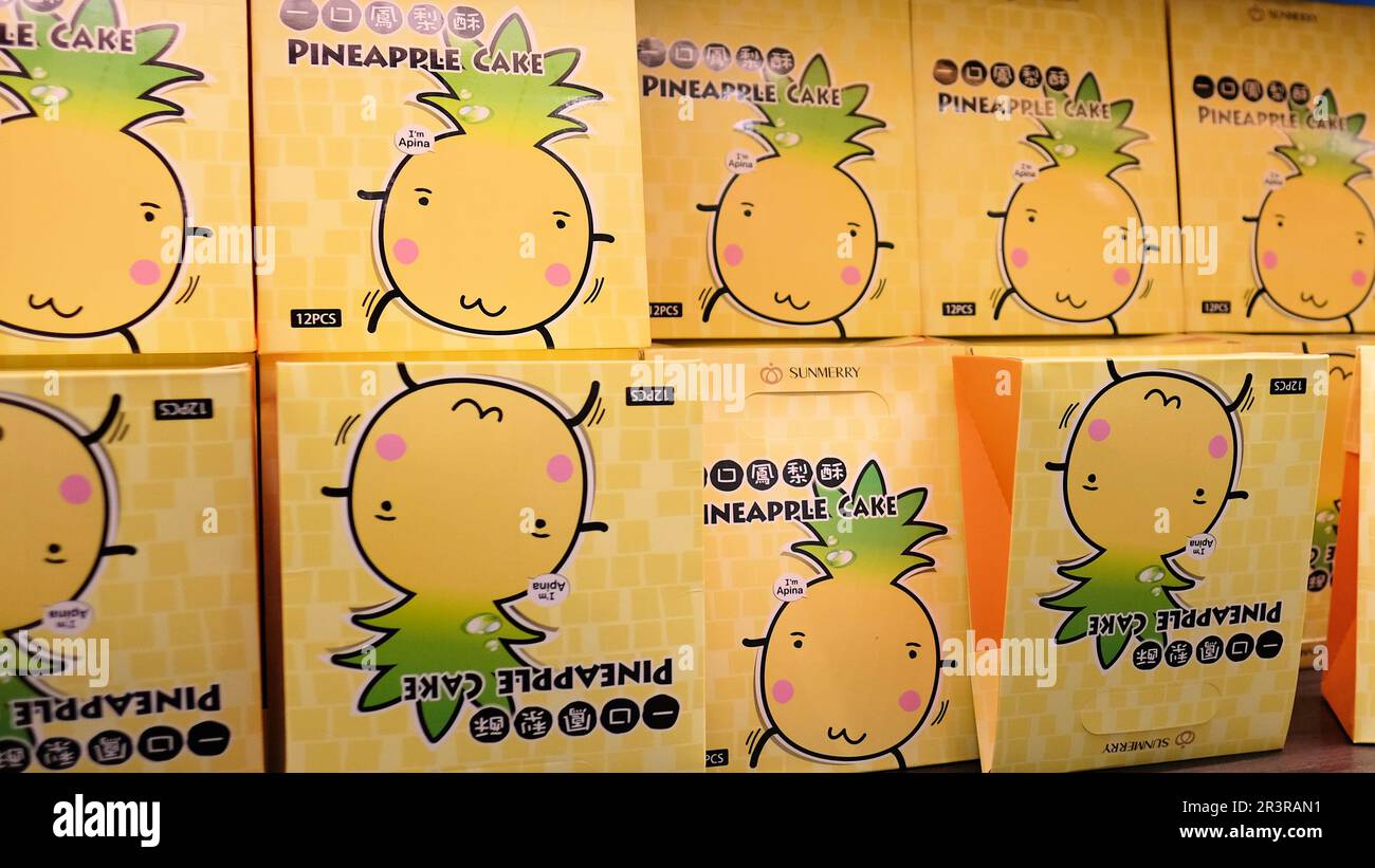 Rows of boxed and packaged pineapple cake at a Sunmerry bakery store in