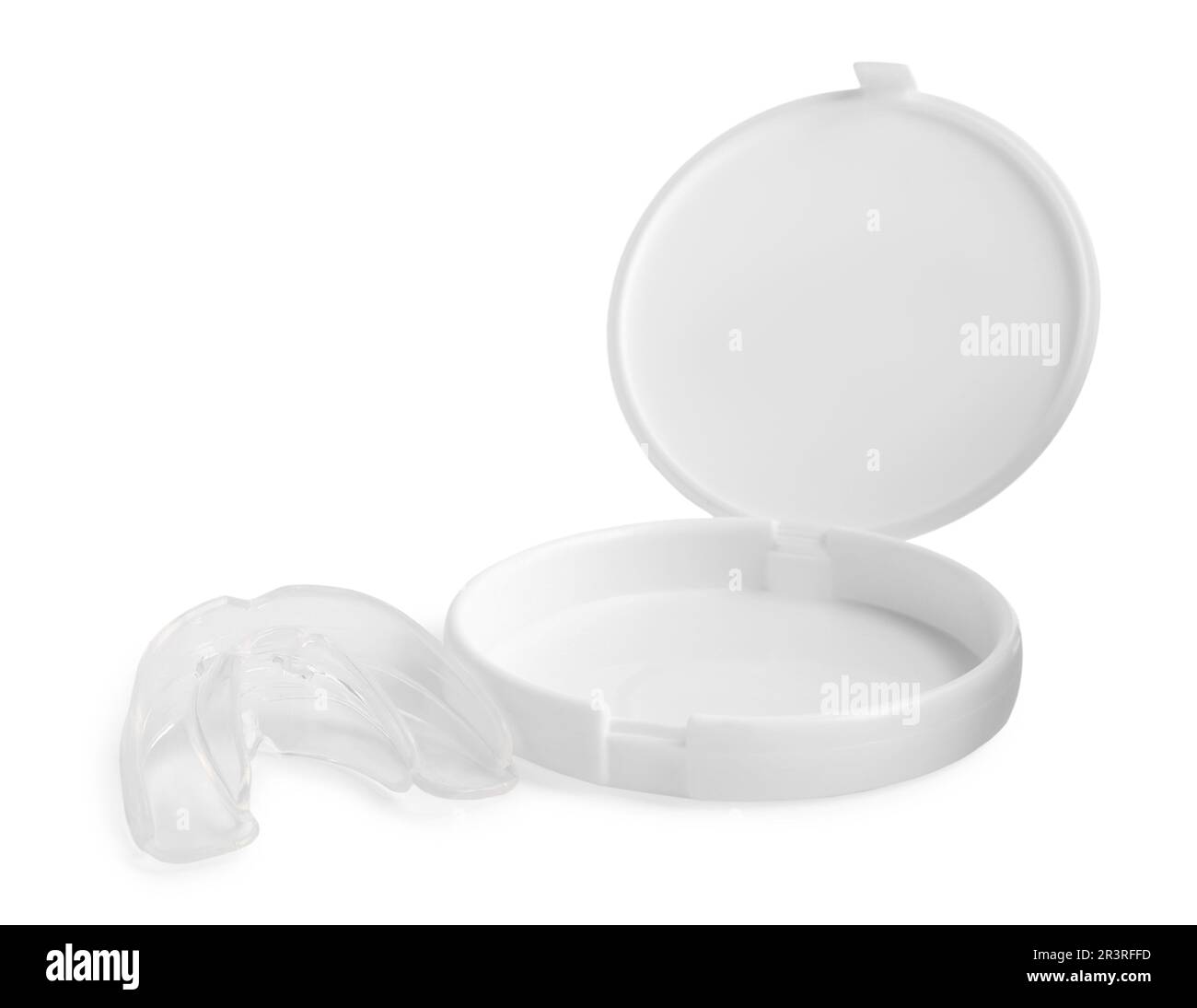 Transparent dental mouth guard and container on white background. Bite correction Stock Photo