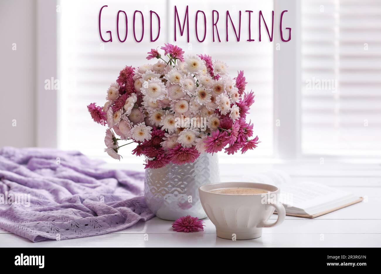 Good morning! Cup of fresh coffee, open book and beautiful bouquet ...