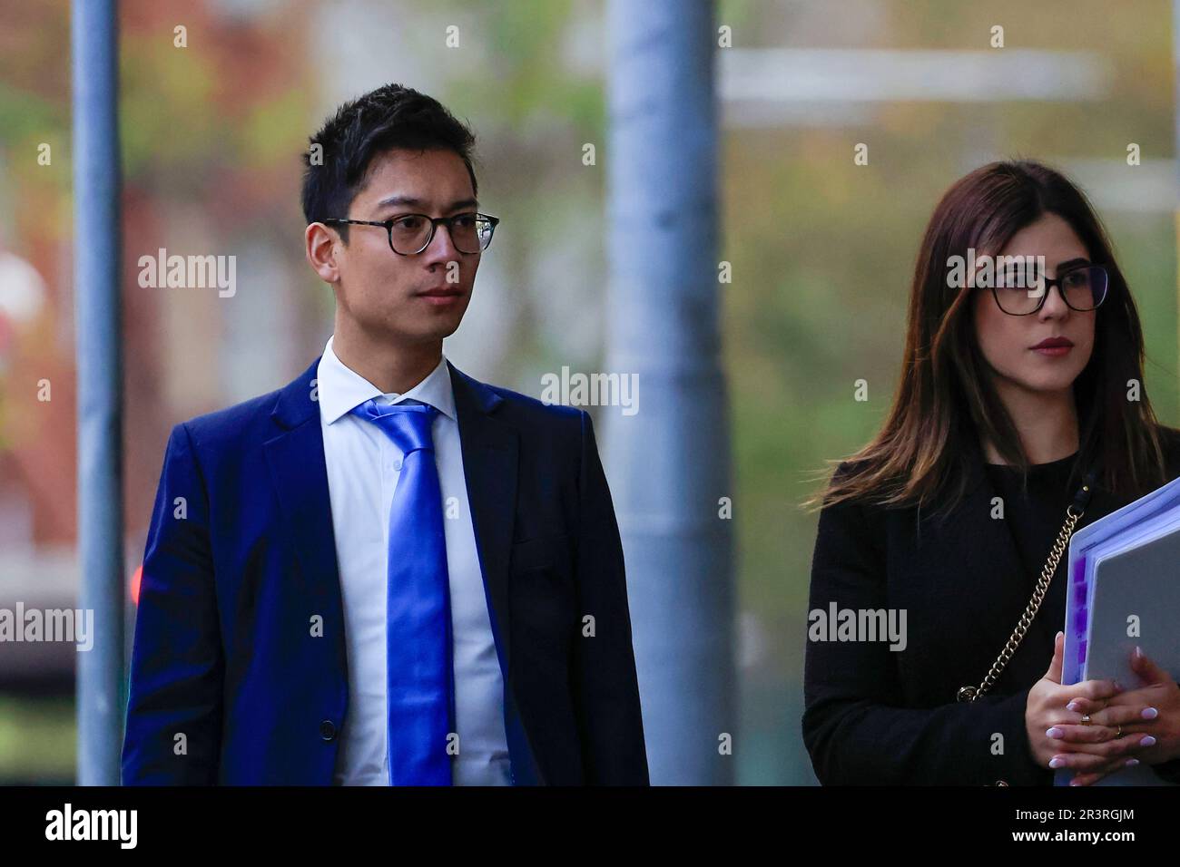 Jeremy So (L) arrives at the John Maddison Tower in Sydney, Thursday ...