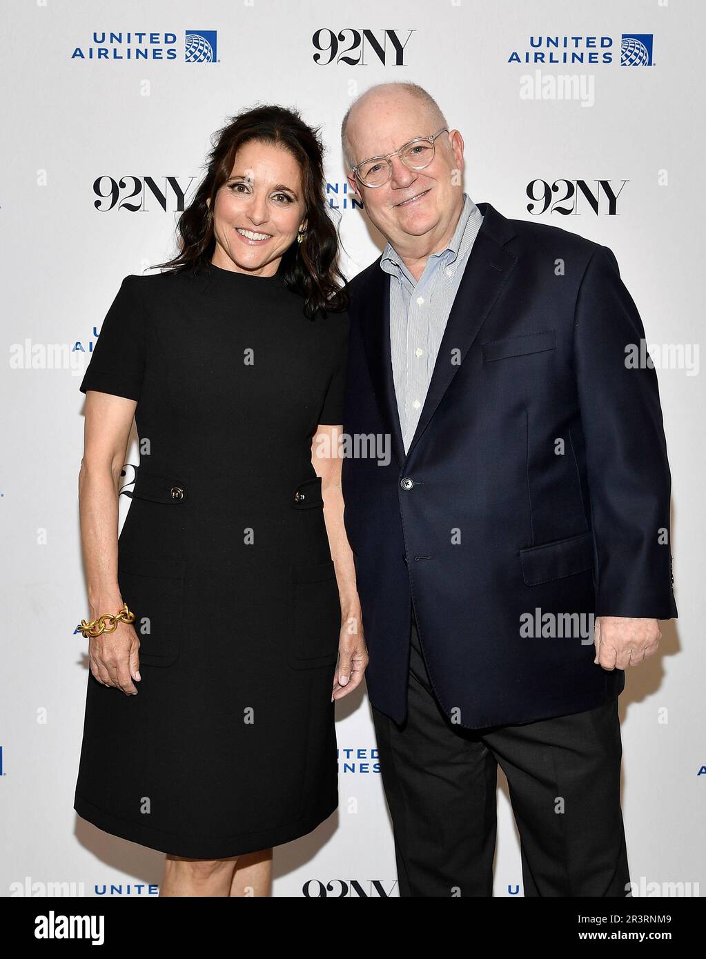 Julia Louis Dreyfus, left, and moderator Frank Rich pose together