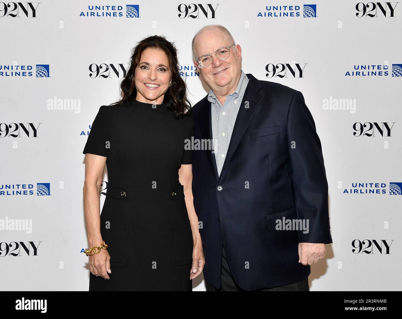 Julia Louis Dreyfus, left, and moderator Frank Rich pose together