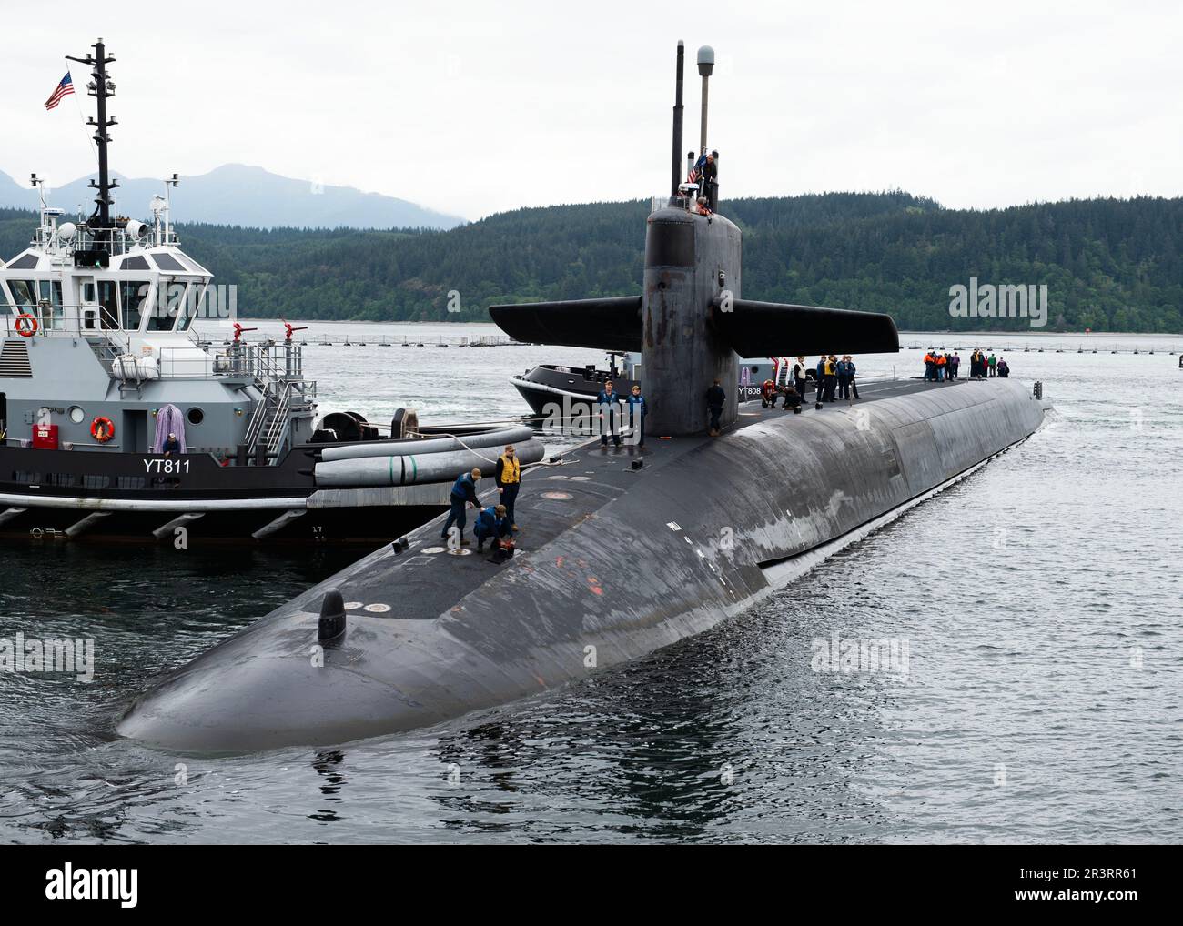 230522-N-ED185-1006  NAVAL BASE KITSAP – BANGOR, Wash. (May 22, 2023) The Ohio-class ballistic missile submarine USS Nevada (SSBN 733) prepares to moor at Naval Base Kitsap – Bangor, Washington, May 22, 2023. Nevada is one of eight ballistic-missile submarines stationed at Naval Base Kitsap-Bangor, providing the most survivable leg of the strategic deterrence triad for the United States. (U.S. Navy photo by Mass Communication Specialist 1st Class Brian G. Reynolds) Stock Photo