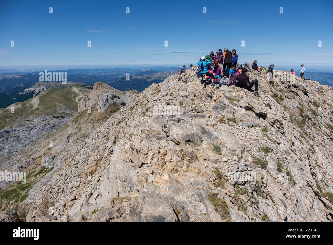 montañeros en la cima de La mesa de los Tres Reyes , 2442m., Huesca, Aragón, Spain, Europe. Stock Photo