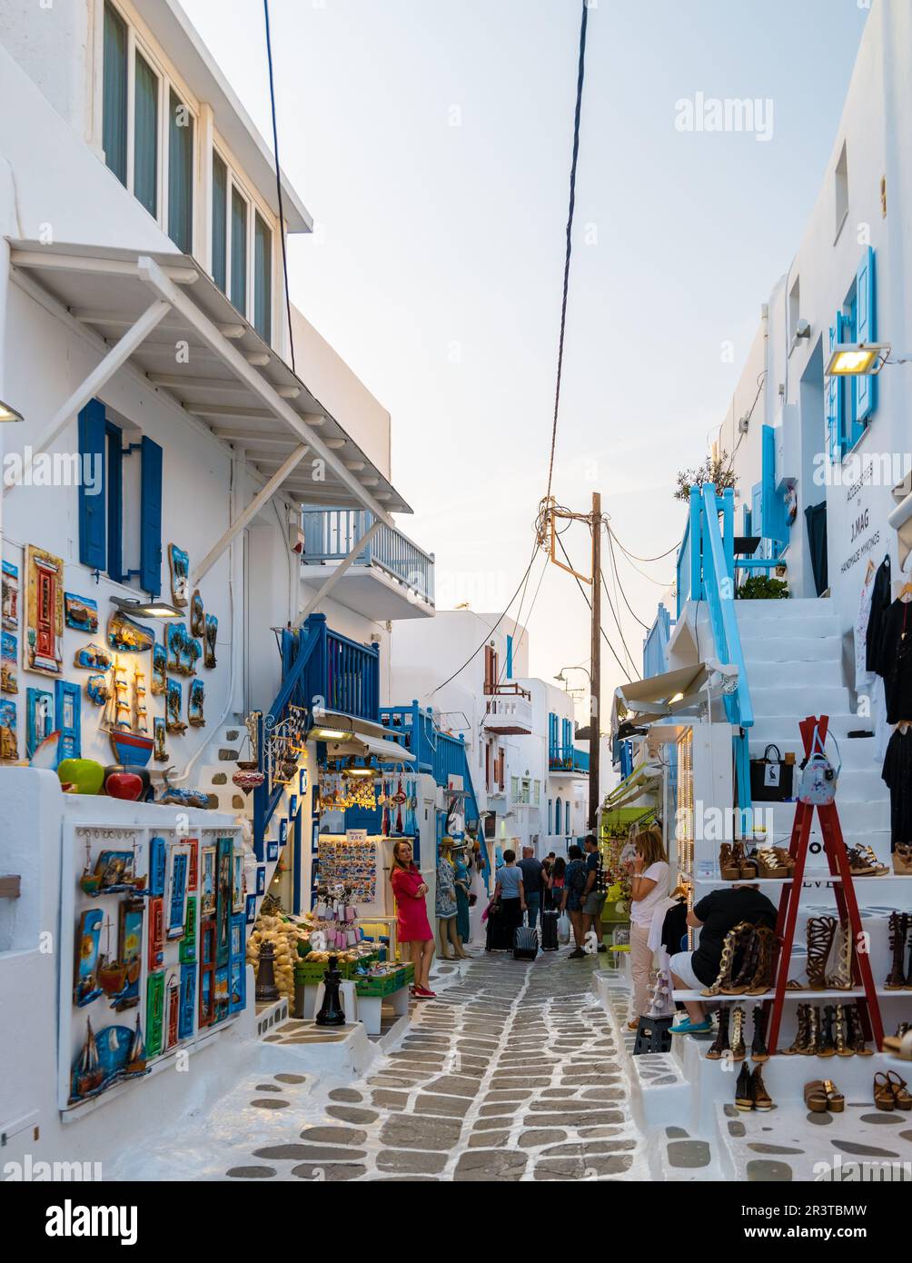 Tourist At The Streets Of Mykonos Greek Village In Greece Colorful 