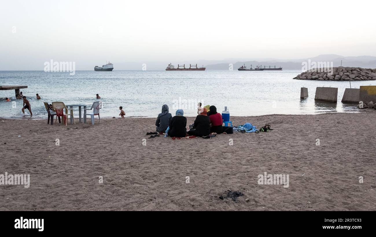 Sunset at Aqaba beach, Jordan's gateway to the Red Sea. Aqaba is renowned for its stunning 