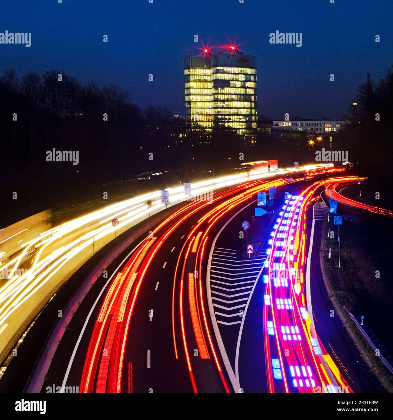 Highway A 52 and the E.ON SE corporate headquarters in the evening, Essen, Germany, Europe Stock Photo