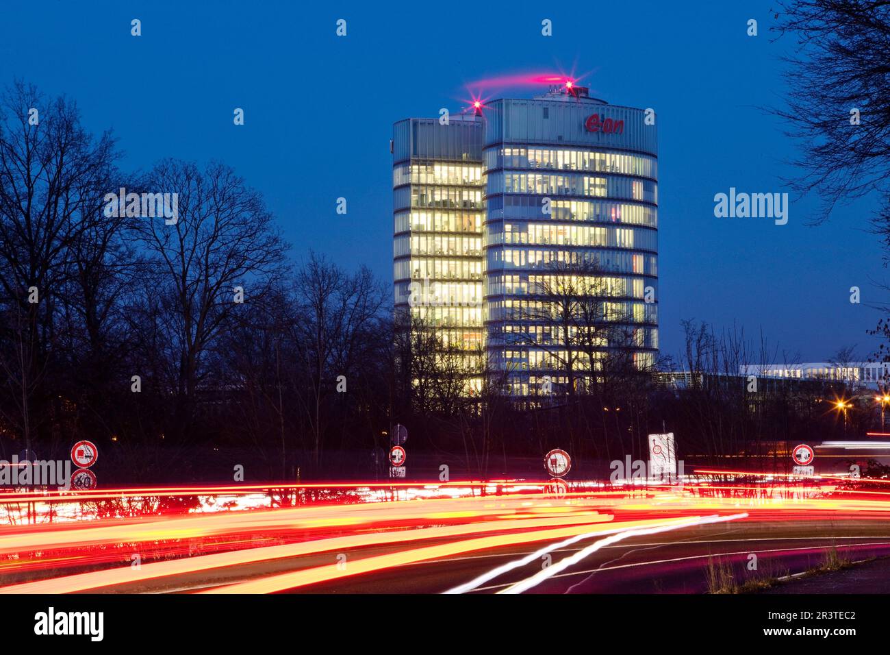 Highway A 52 and the E.ON SE corporate headquarters in the evening, Essen, Germany, Europe Stock Photo