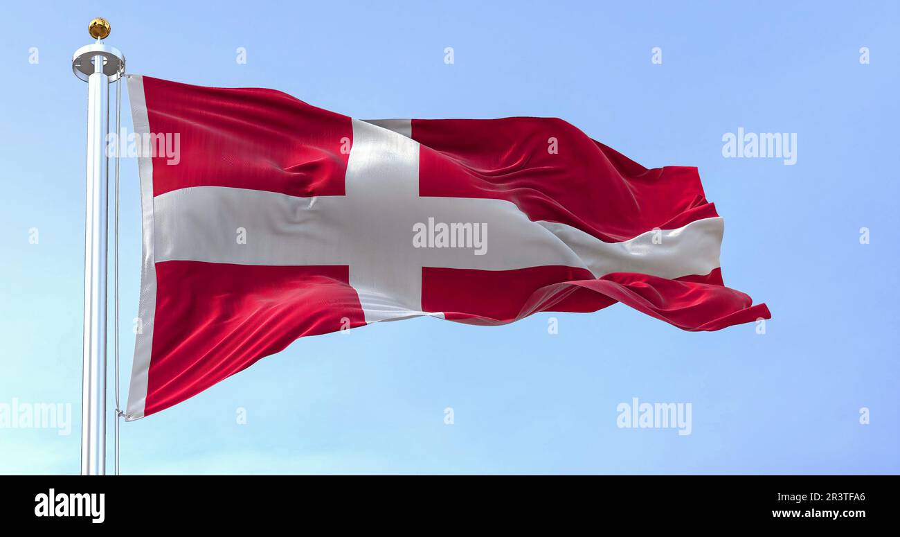 Denmark national flag waving in the wind on a clear day. Stock Photo