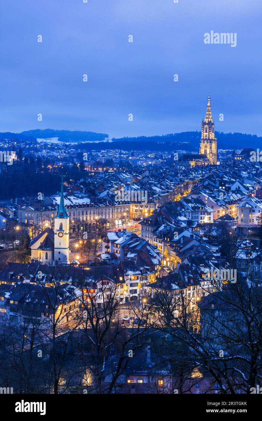 Old twon of Bern in winter blue hour with snowy and illuminated buildings, Rosengarten, Bern, UNESCO, Switzerland Stock Photo