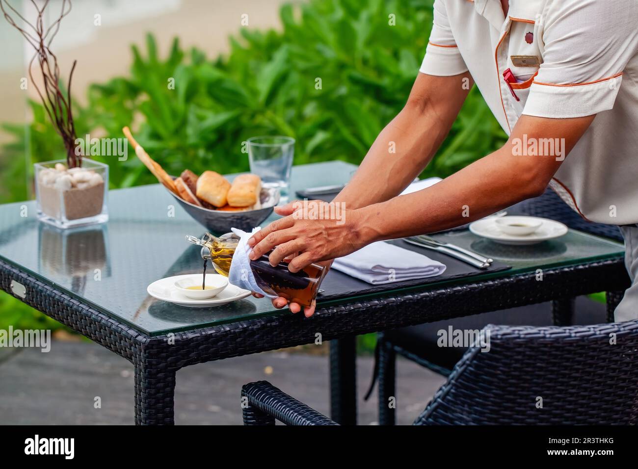 Waiter serves drink drinks hi-res stock photography and images - Alamy