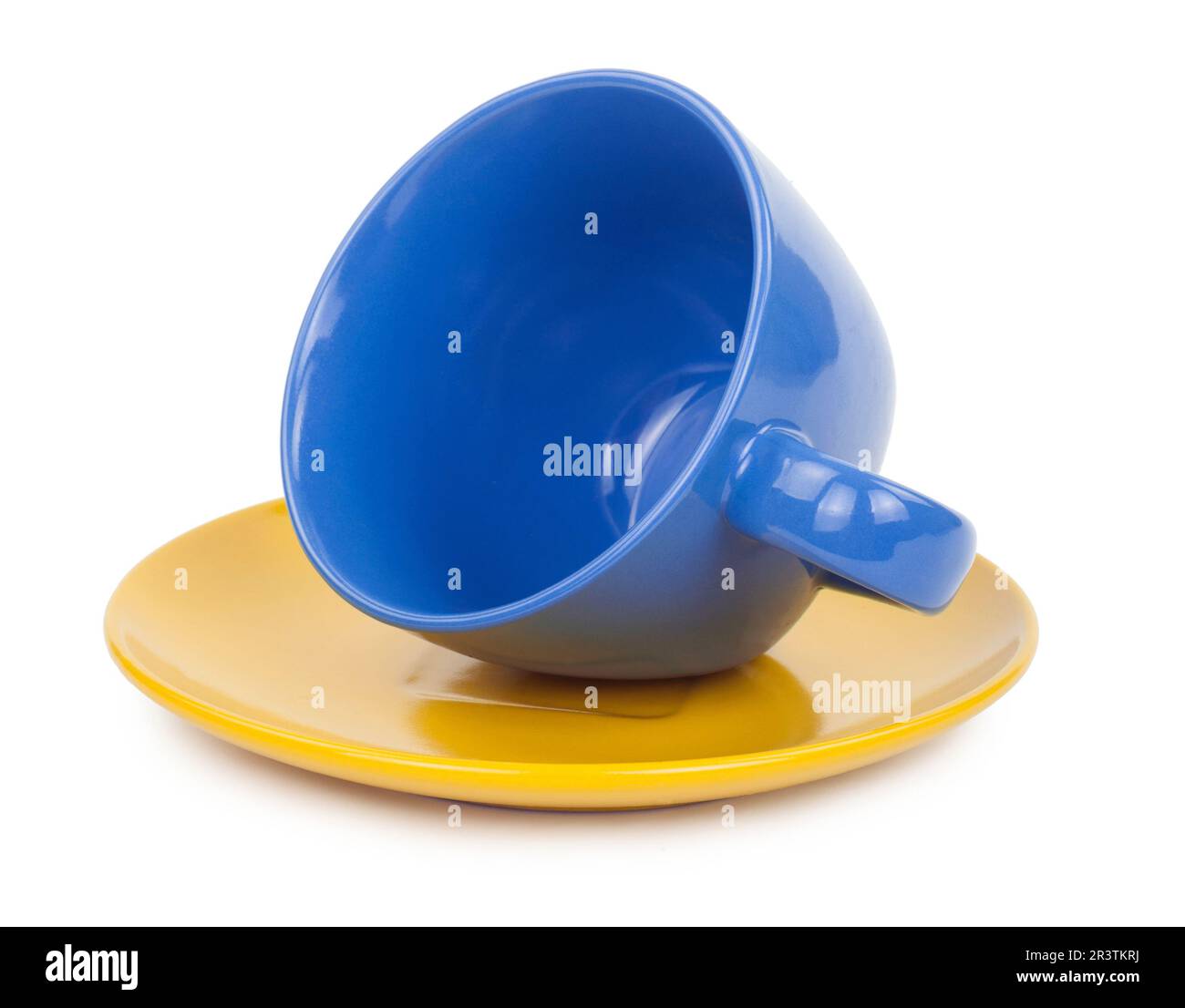 Blue cup of tea on a yellow saucer Stock Photo