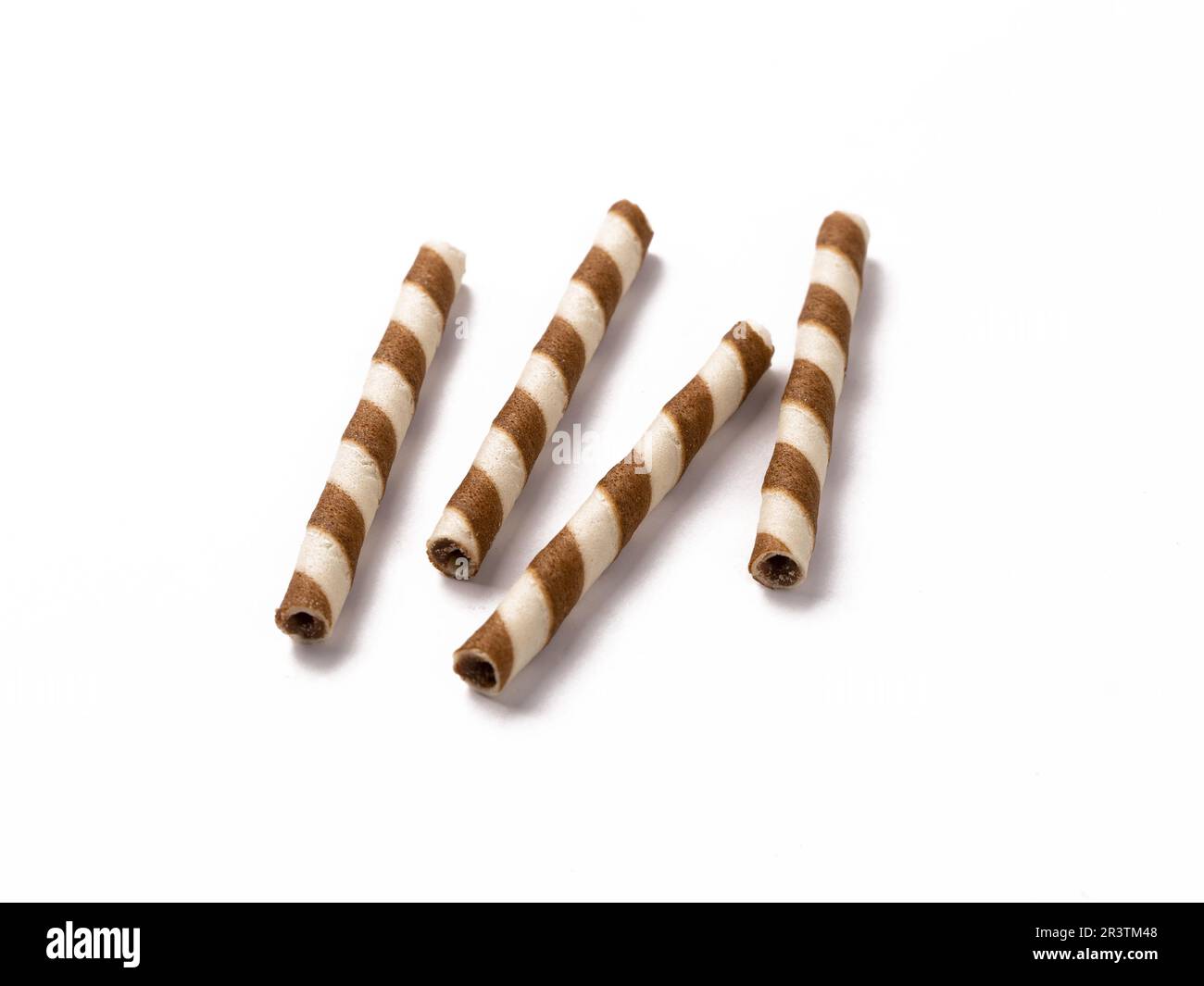 Wafer rolls with chocolate isolated on white background. Stock Photo