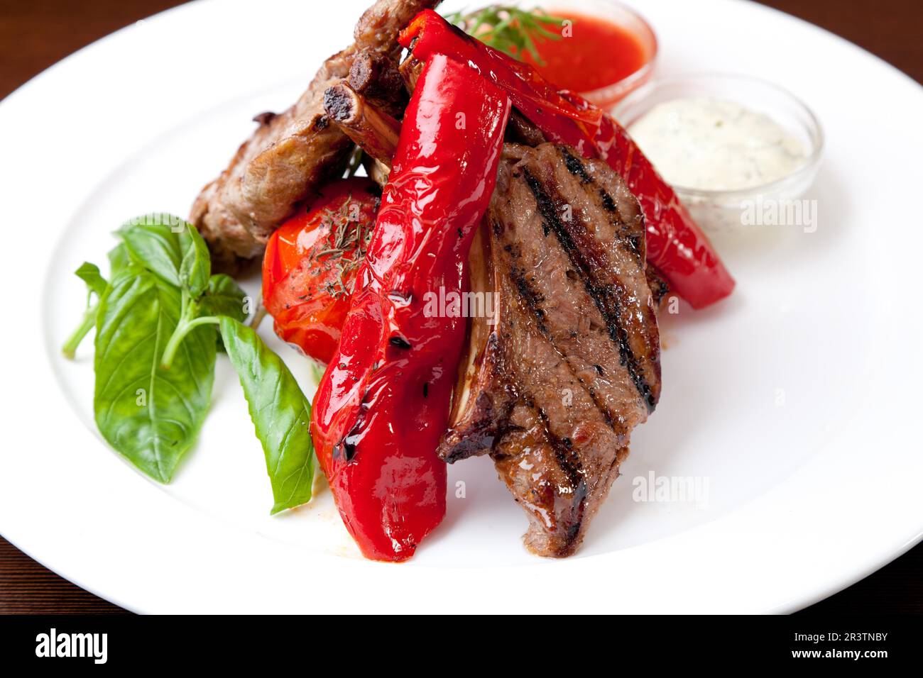 Roasted Chops on a white plate Stock Photo