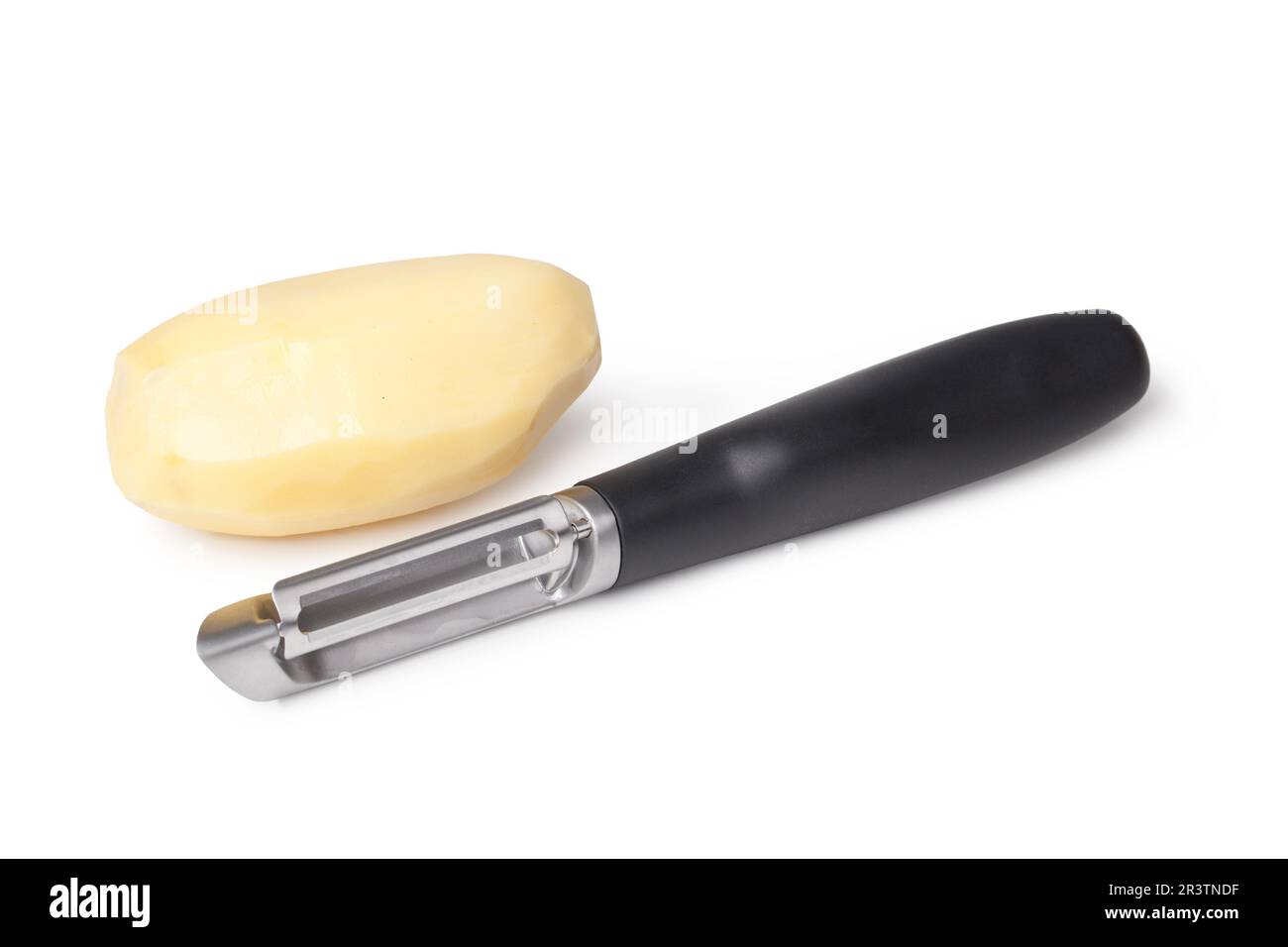 An Electric Potato Peeler On A White Surface Photograph by Jalag