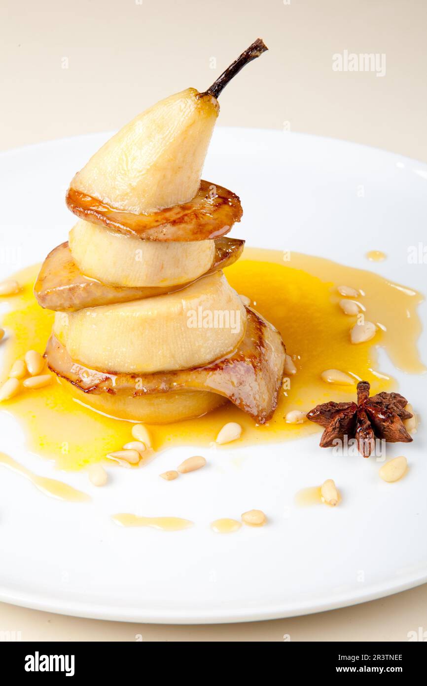 Fried foie gras with pear and sauce Stock Photo