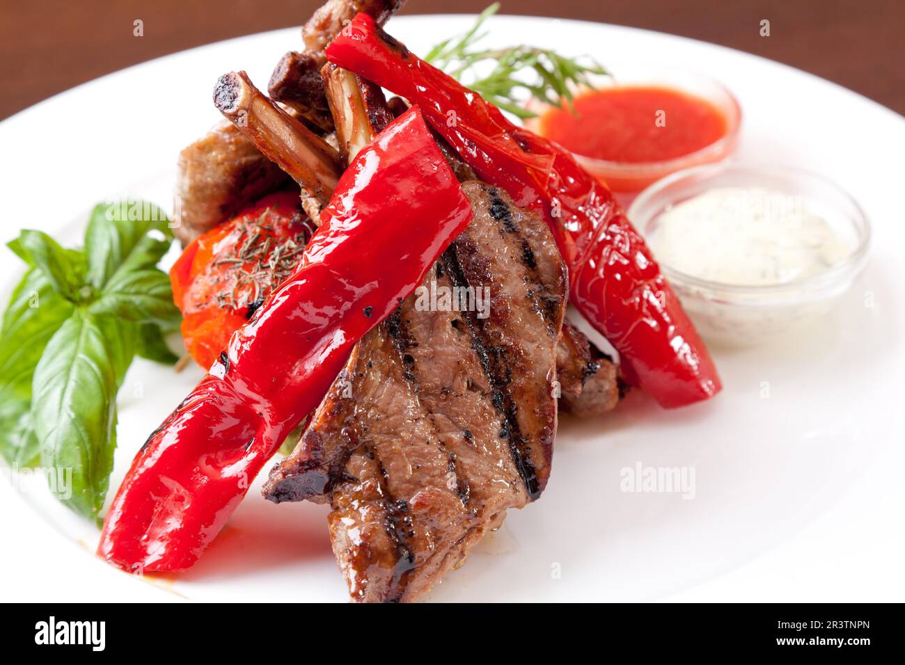 Roasted Chops on a white plate Stock Photo