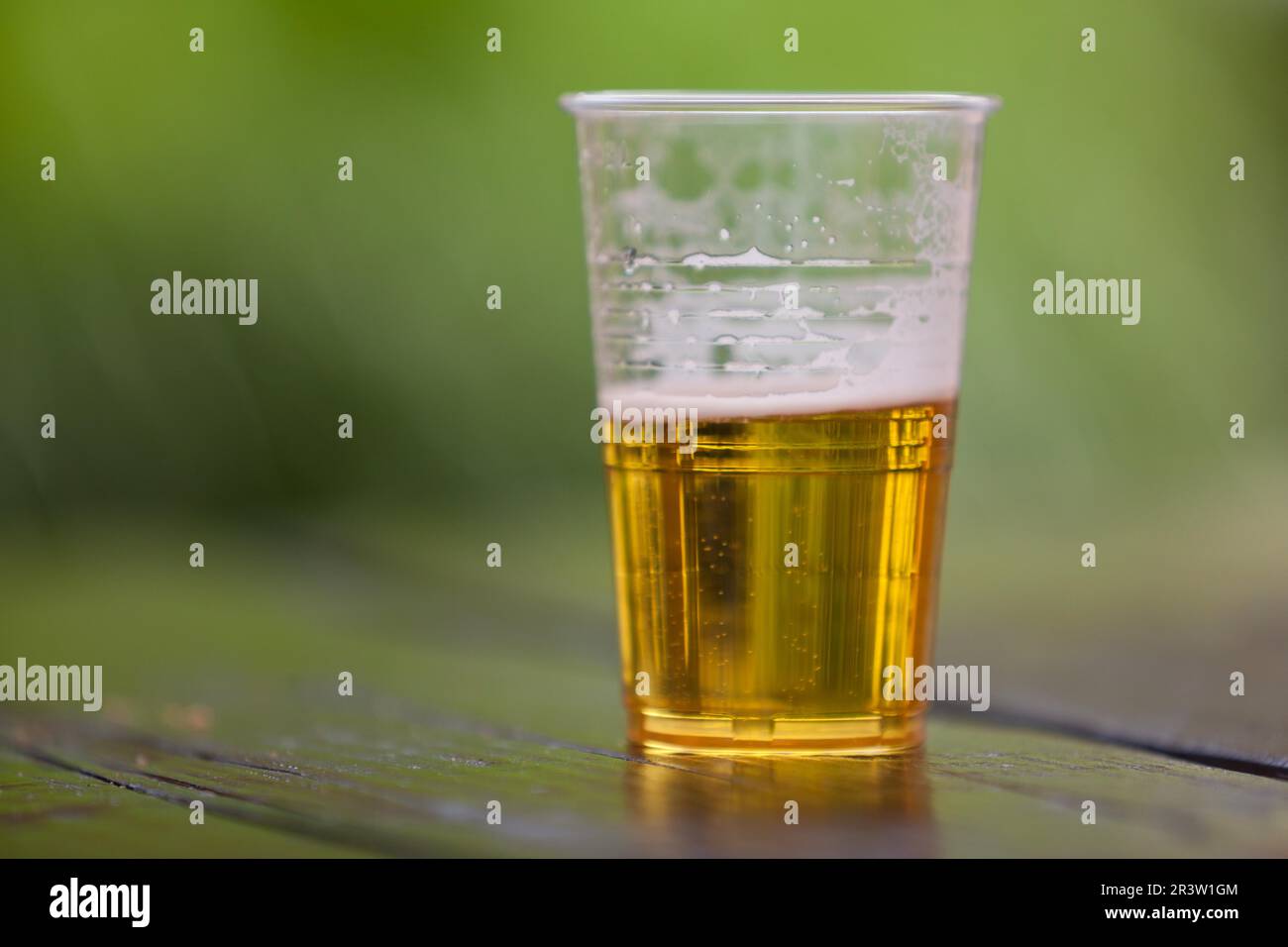 Half full beer glass Stock Photo