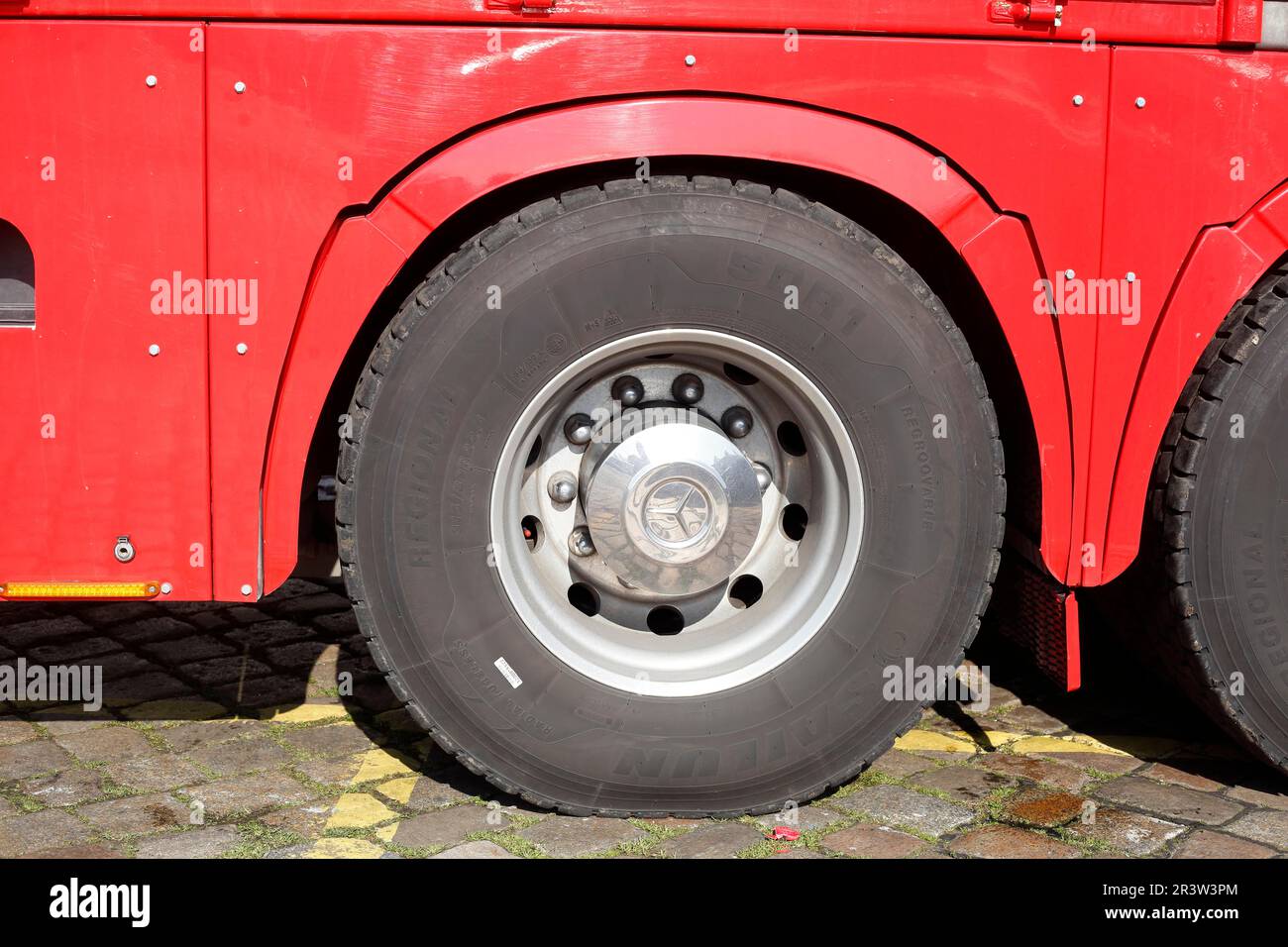 Wheel and tyre on a red Mercedes truck, Germany Stock Photo