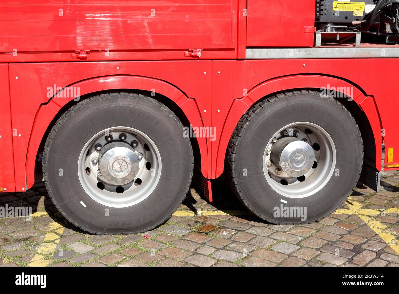 Wheels and tyres on a red Mercedes truck, Germany Stock Photo