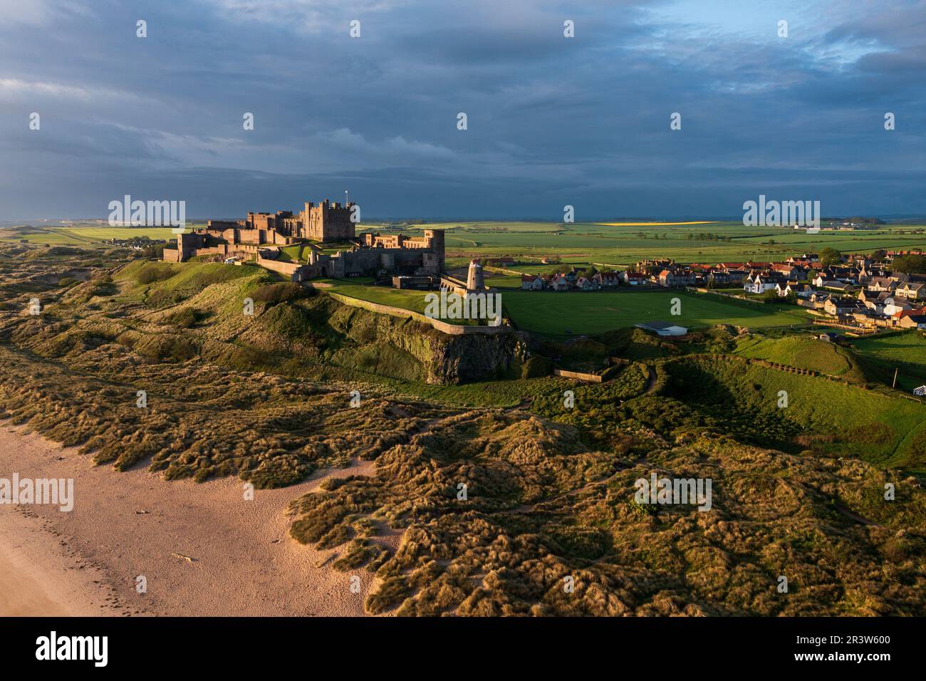 Aerial view of the iconic Bamburgh Castle on the coastline of ...
