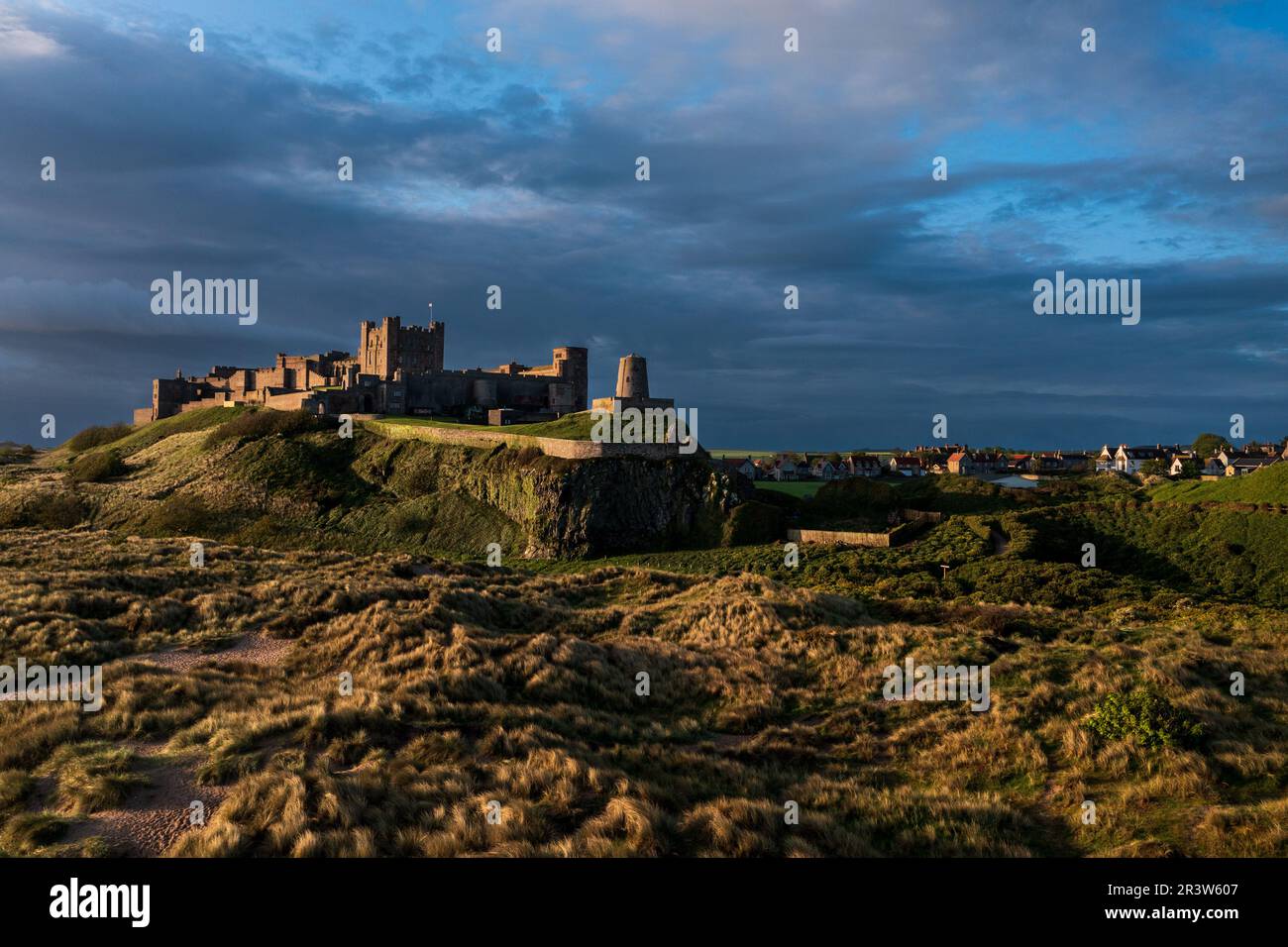 Aerial view of the iconic Bamburgh Castle on the coastline of ...