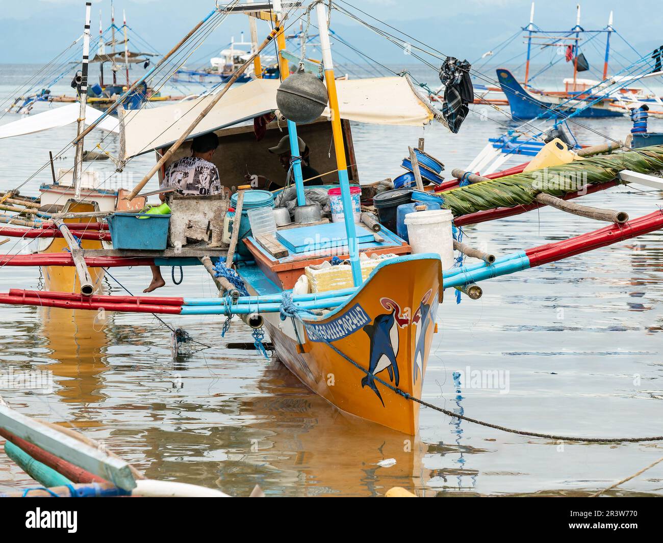 Traditional fishing boats with outriggers in Tinoto, Maasim, located in