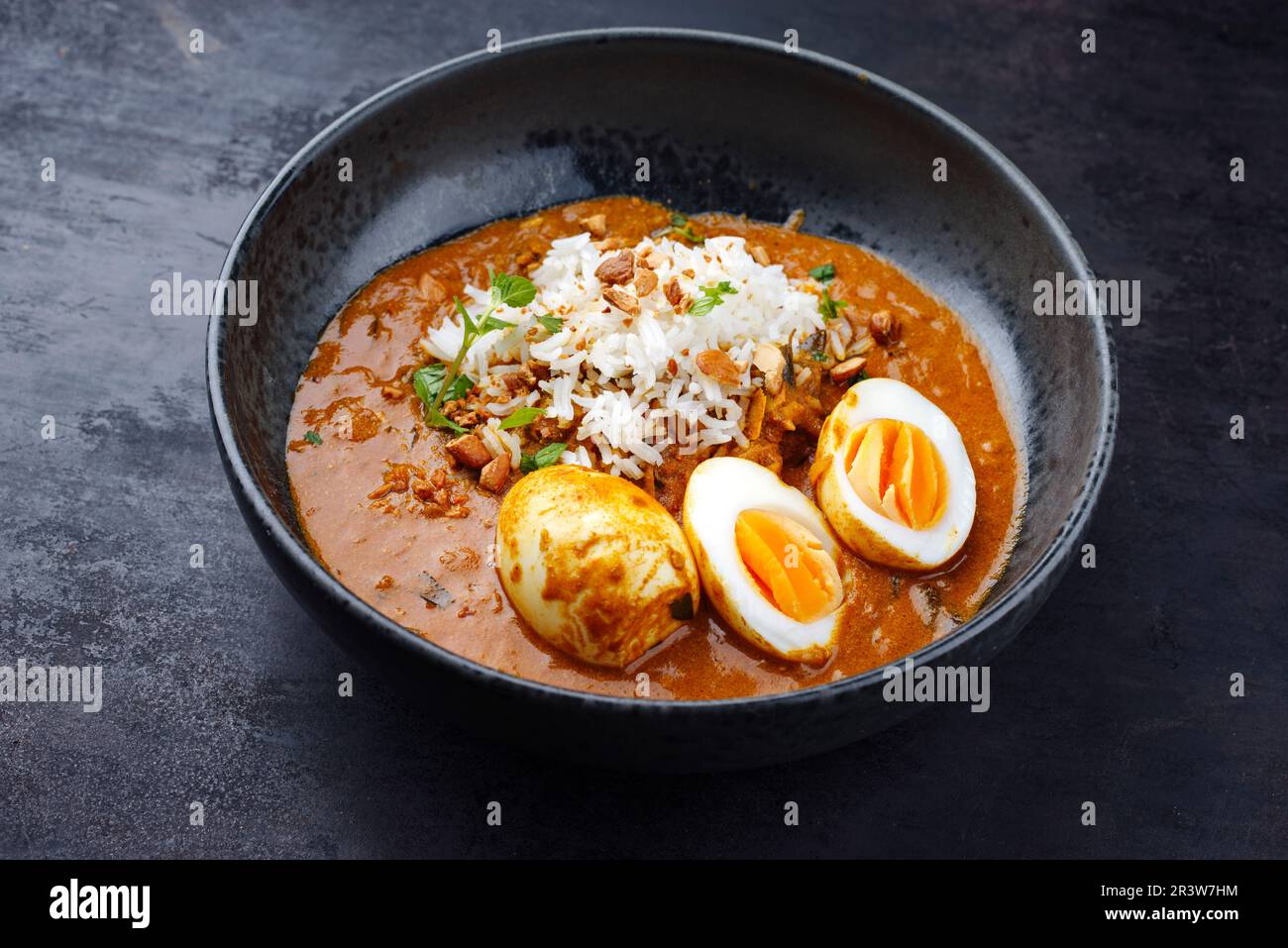 Traditional spicy Indian anda masala curry Rogan Josh with cooked eggs ...