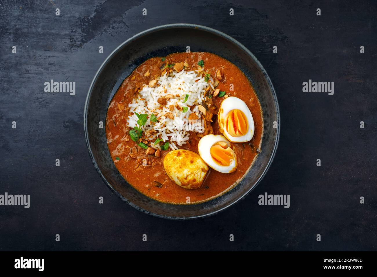 Traditional spicy Indian anda masala curry Rogan Josh with cooked eggs ...