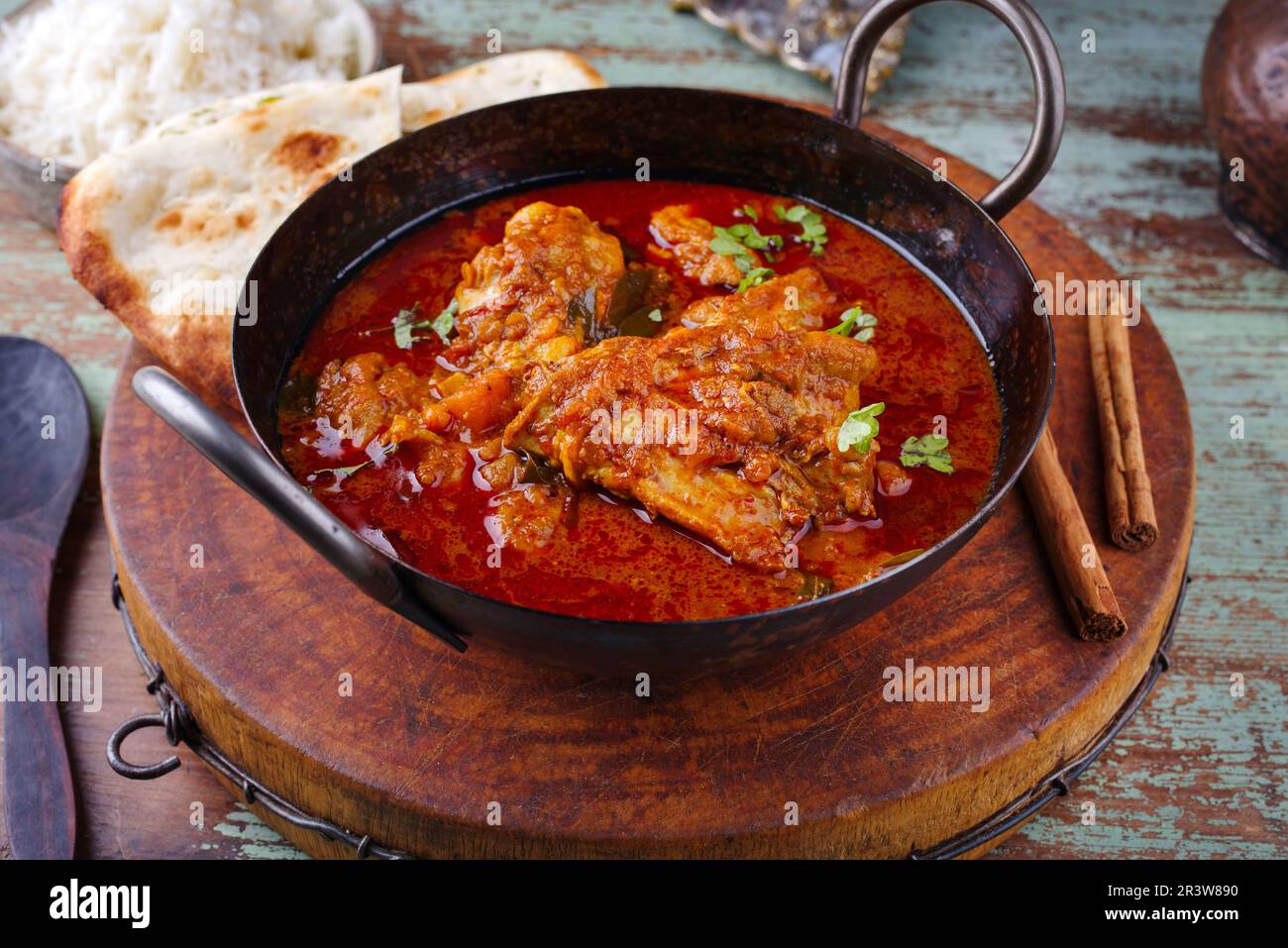 Traditional spicy Indian chicken Madras curry Rogan Josh with drumsticks Stock Photo Alamy