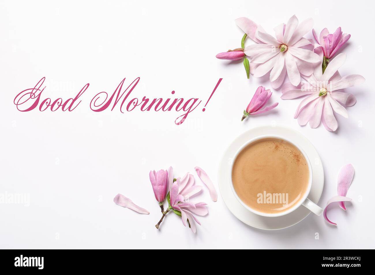 Good morning! Beautiful pink magnolia flowers and cup of aromatic