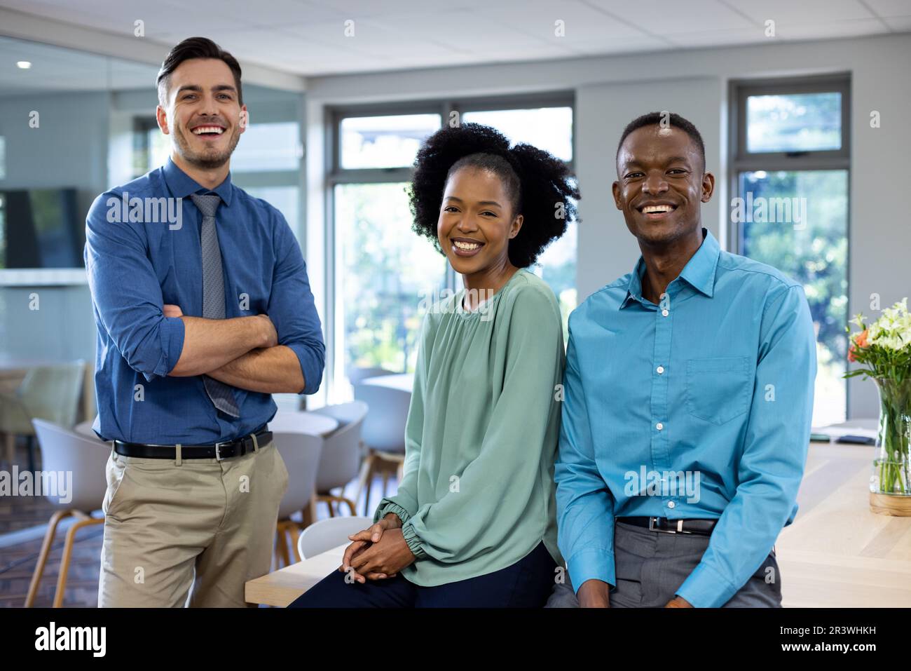 Portrait of happy diverse business people in modern office Stock Photo ...