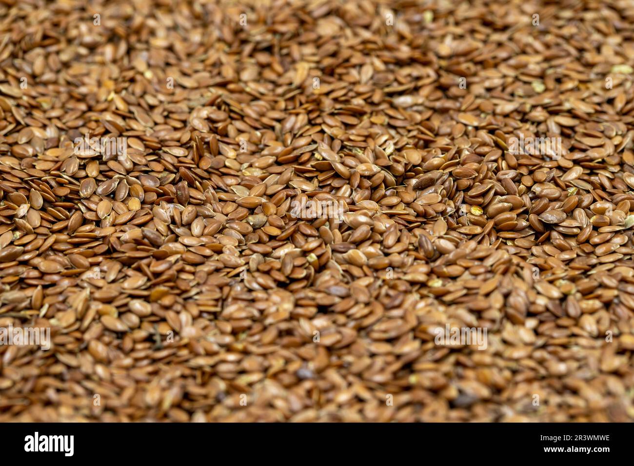 Flax seeds background or texture. Flaxseed or linseed. Cereals. Healthy food Stock Photo