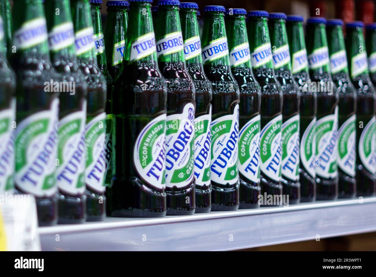 Tyumen, Russia-May 05, 2023: Tuborg beer in bottles on the shelves of the hypermarket. Selective focus Stock Photo