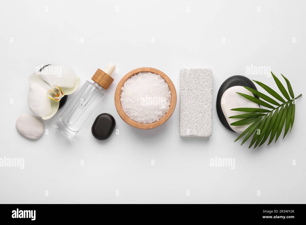 Flat lay composition with different spa products on white background ...