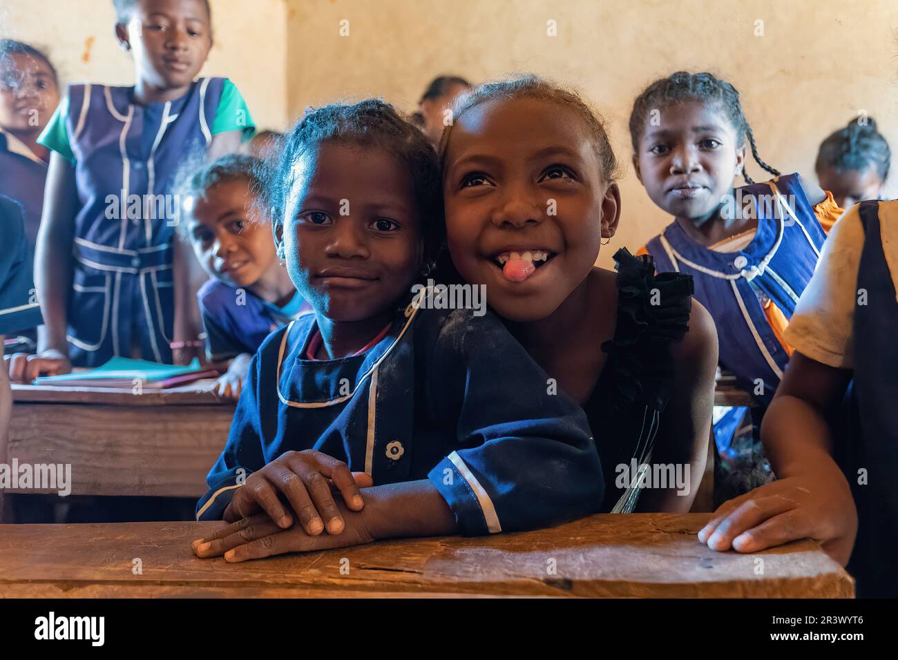 Happy Malagasy school children students in classroom. School attendance ...