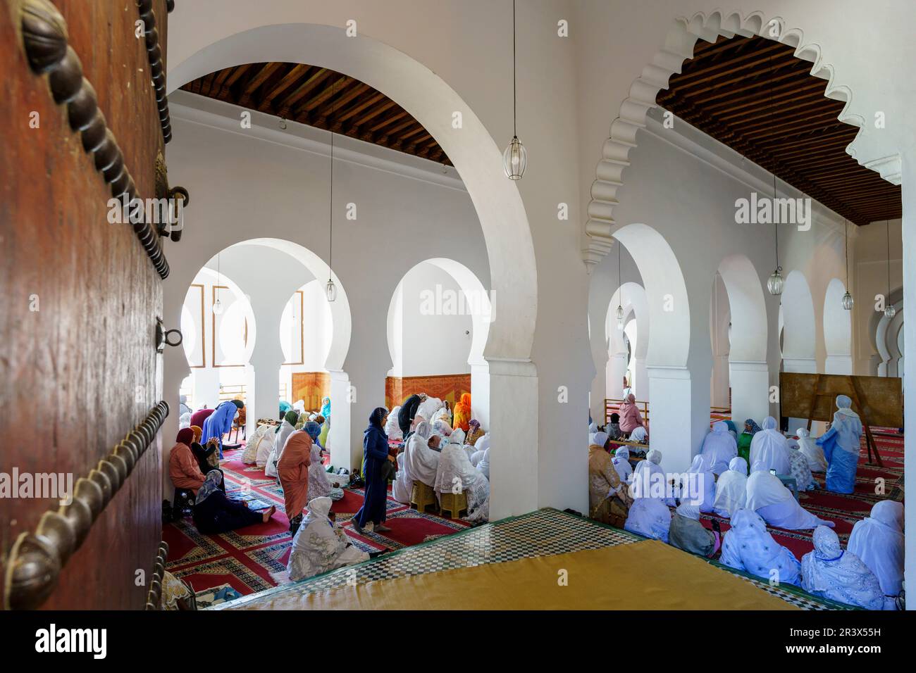 women praying, Al Karaouine Mosque, Built in the year 859, Fez, morocco, africa. Stock Photo