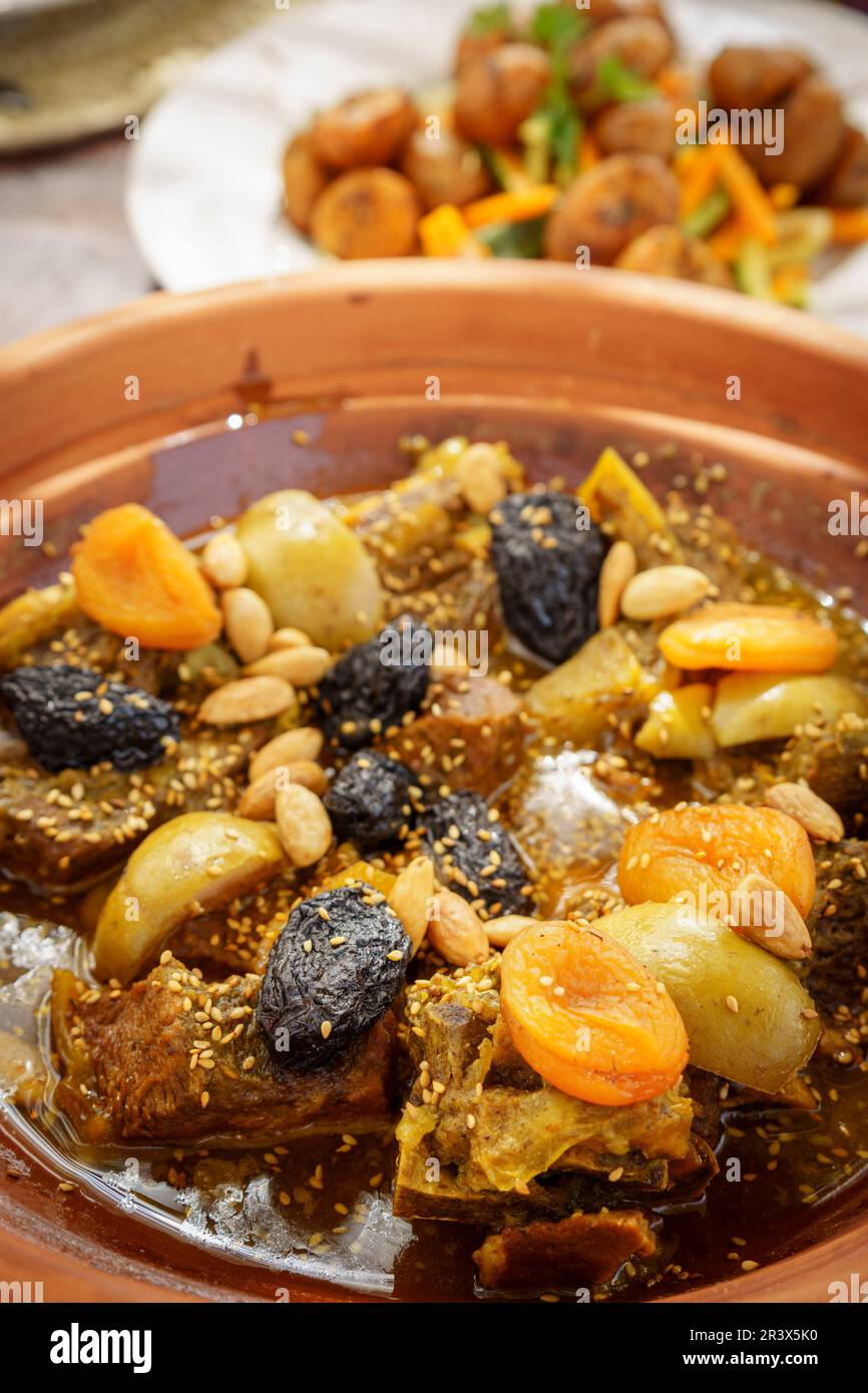 beef tagine with pears, plums and almonds, Berbari Moroccan cuisine