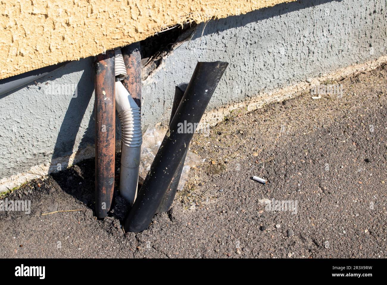 Electrical wires stick out of the ground Stock Photo Alamy