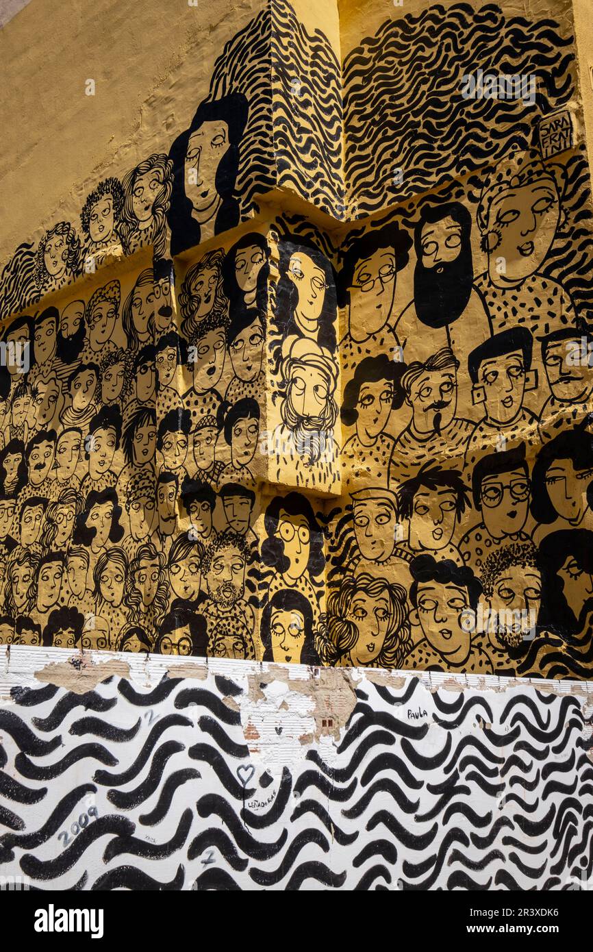 pintura mural callejera representando personas de multiples razas, Soria, Comunidad Autónoma de Castilla, Spain, Europe. Stock Photo